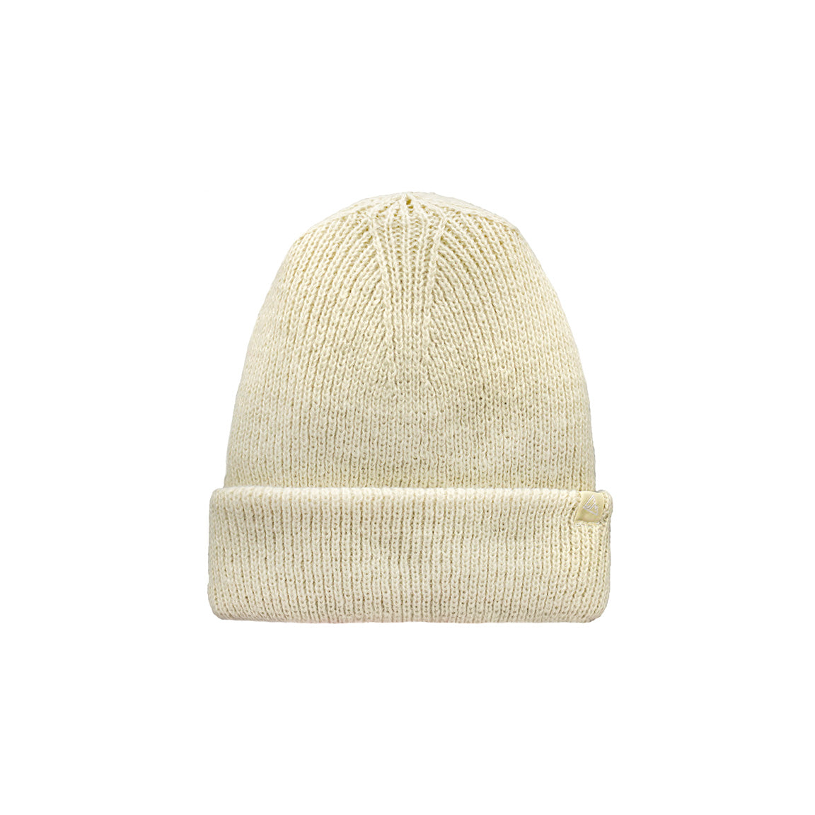 Displayed is a cream-colored knitted beanie, ribbed throughout, featuring a folded cuff with a tiny triangular tag.