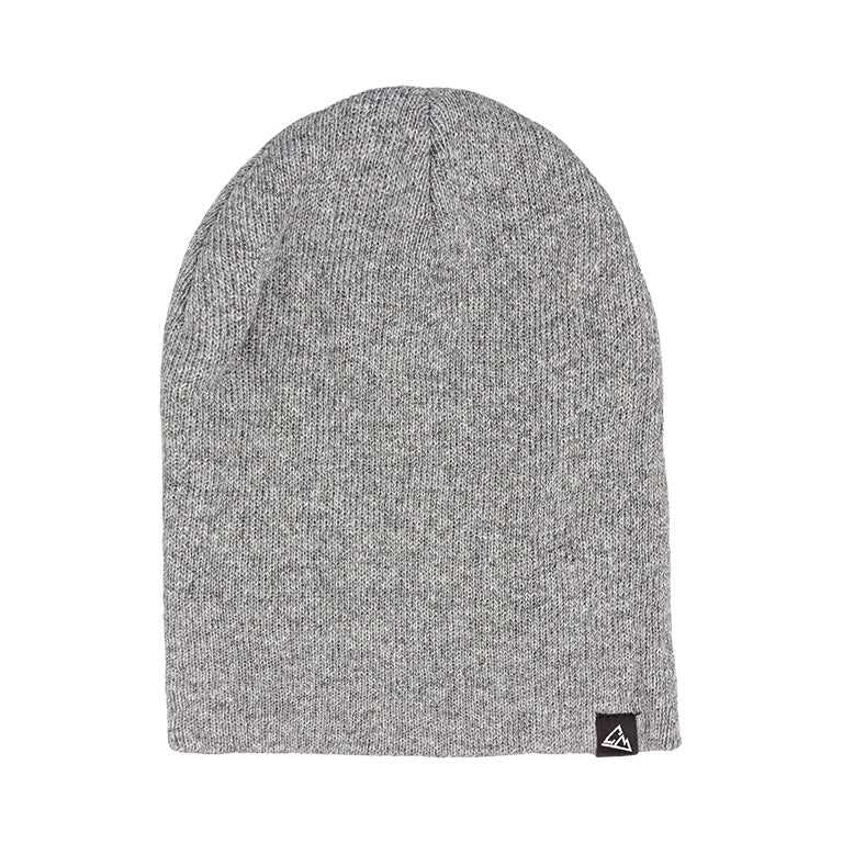 This image shows a plain gray knitted beanie, featuring a fine texture and adorned with a small triangular logo on the side.