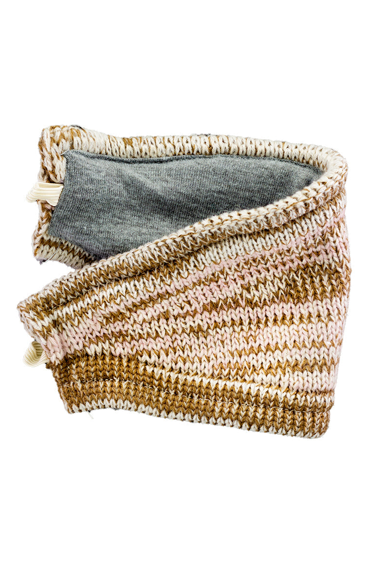 A detached mask from the beige knitted beanie